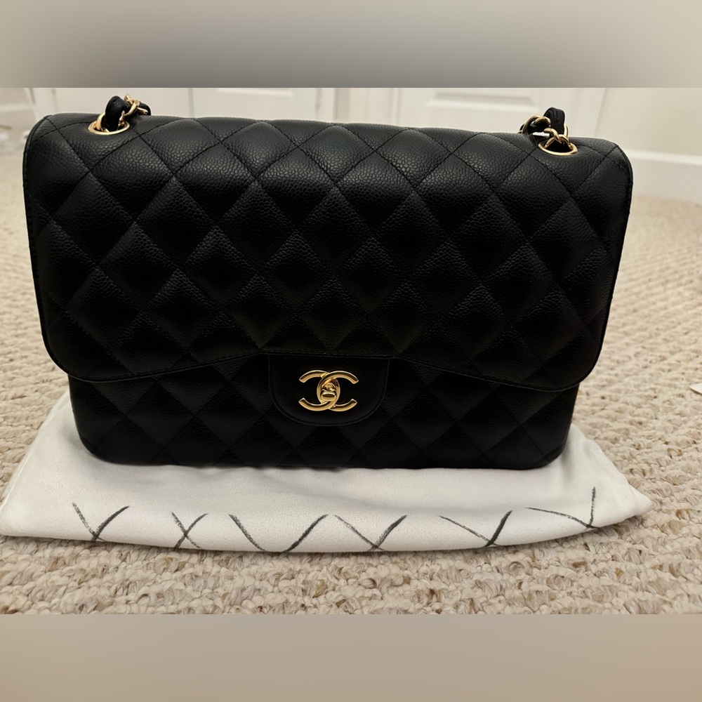 Chanel Classic Jumbo Double Flap Black Caviar Gold Hardware